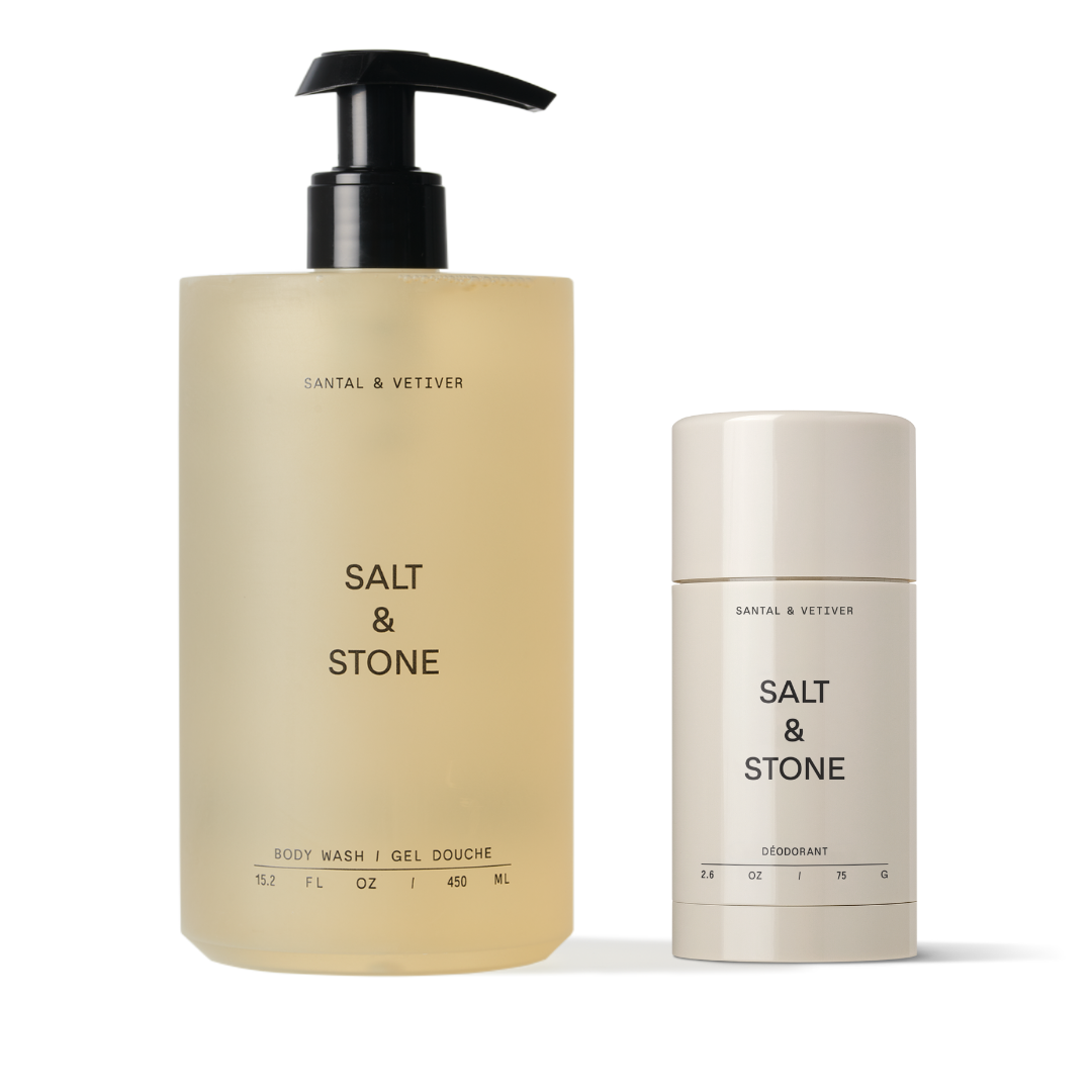 A bottle of Salt & Stone shower gel and a stick deodorant, both in beige.