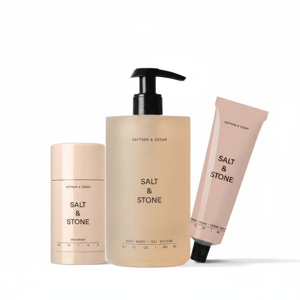 Salt & Stone Saffron & Cedar Body Ritual Set — natural deodorant, body wash and hand cream on white background